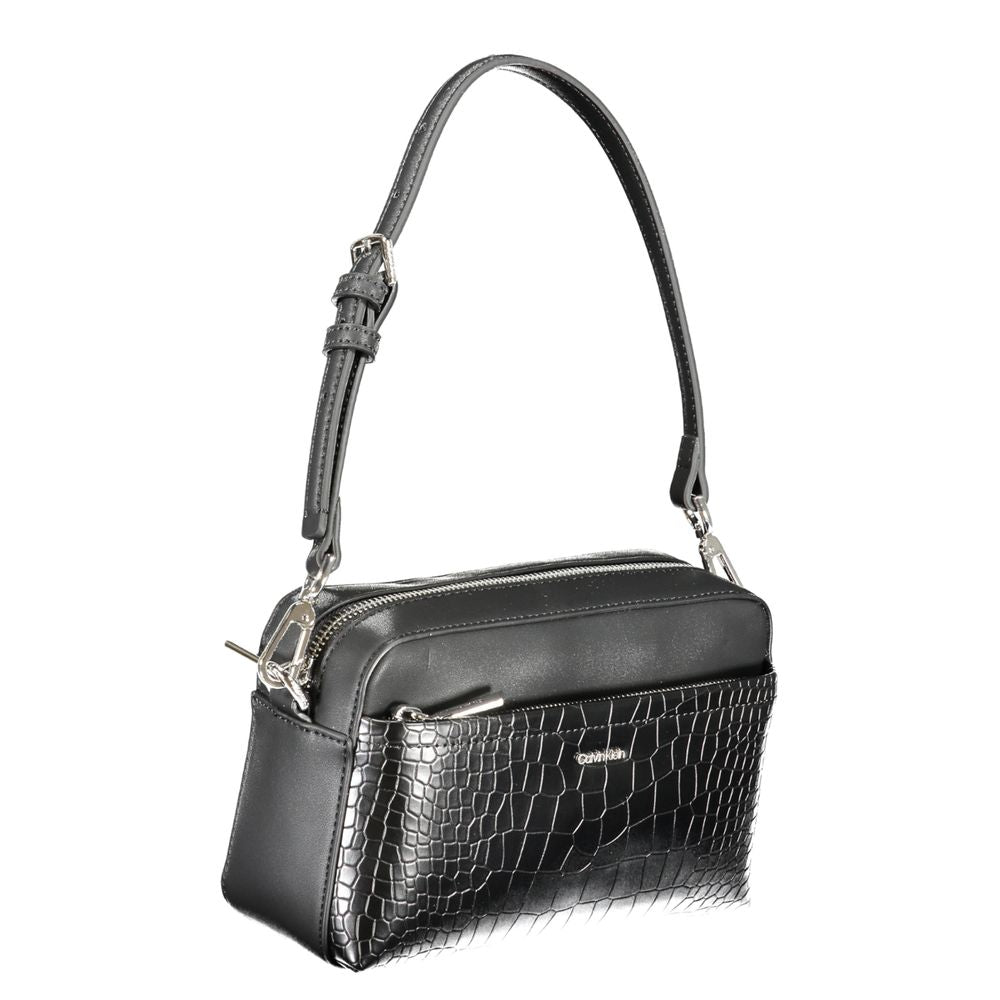 Calvin Klein Black Polyester Handbag with adjustable strap, external pocket, contrast details, and logo.