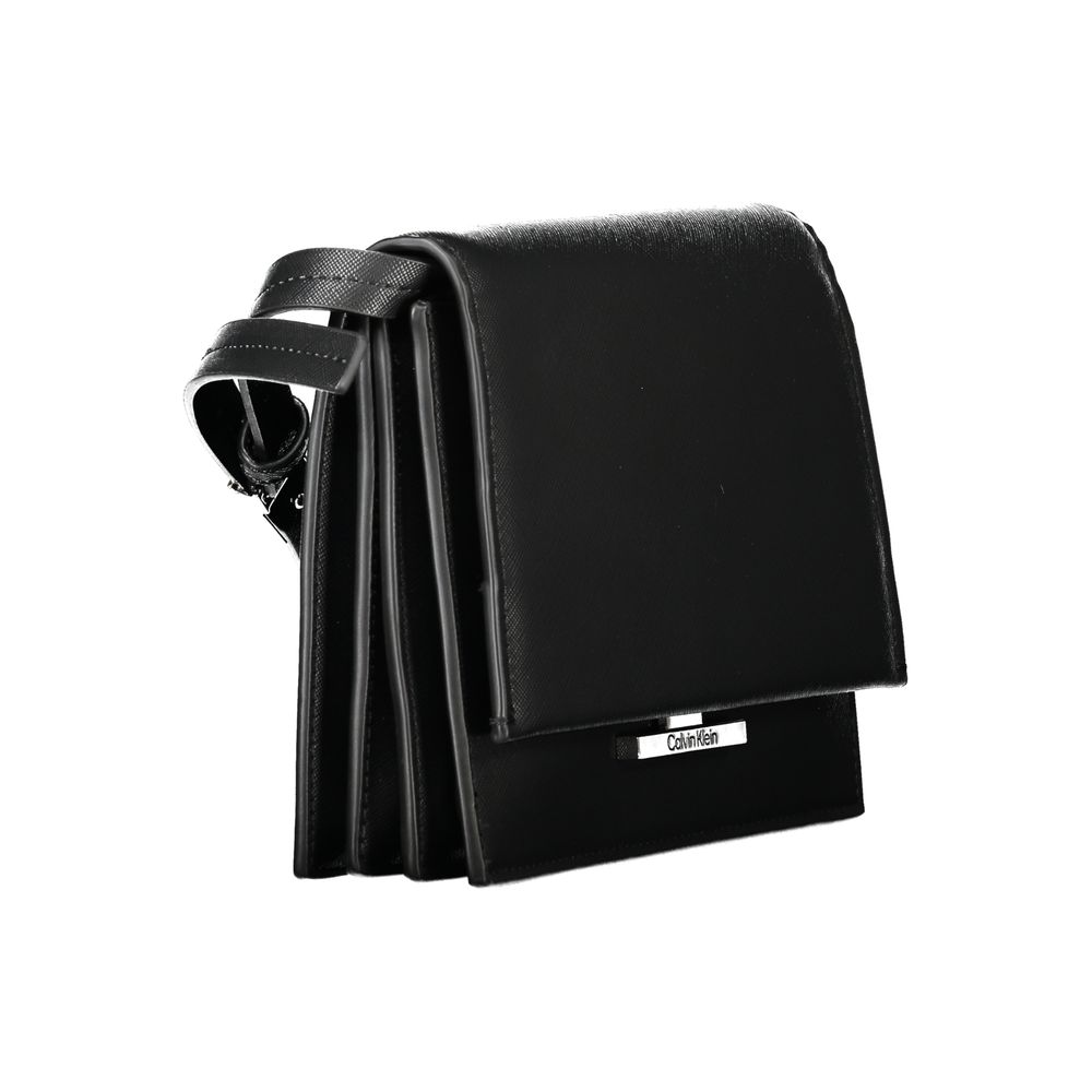 Calvin Klein Black Polyethylene Handbag with adjustable shoulder strap, three compartments, internal pocket, and logo snap closure.