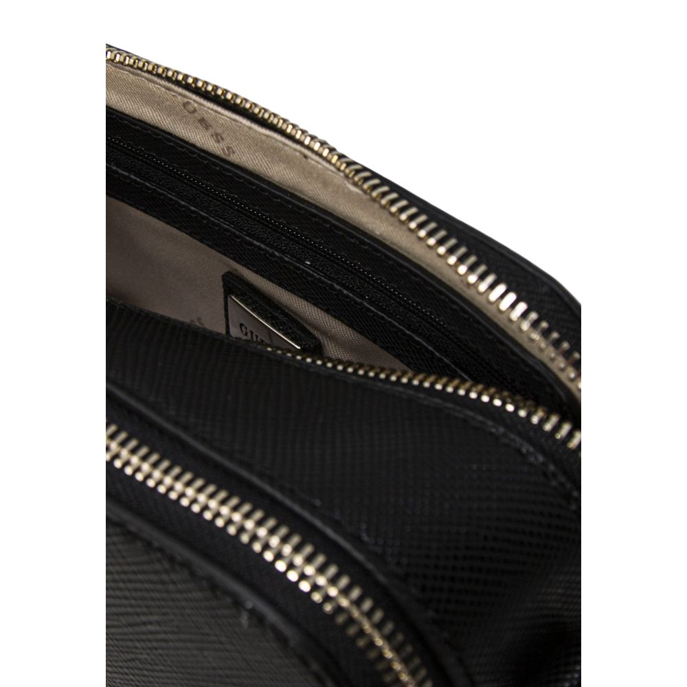 Interior view of Guess Black Polyethylene Handbag with zip compartments
