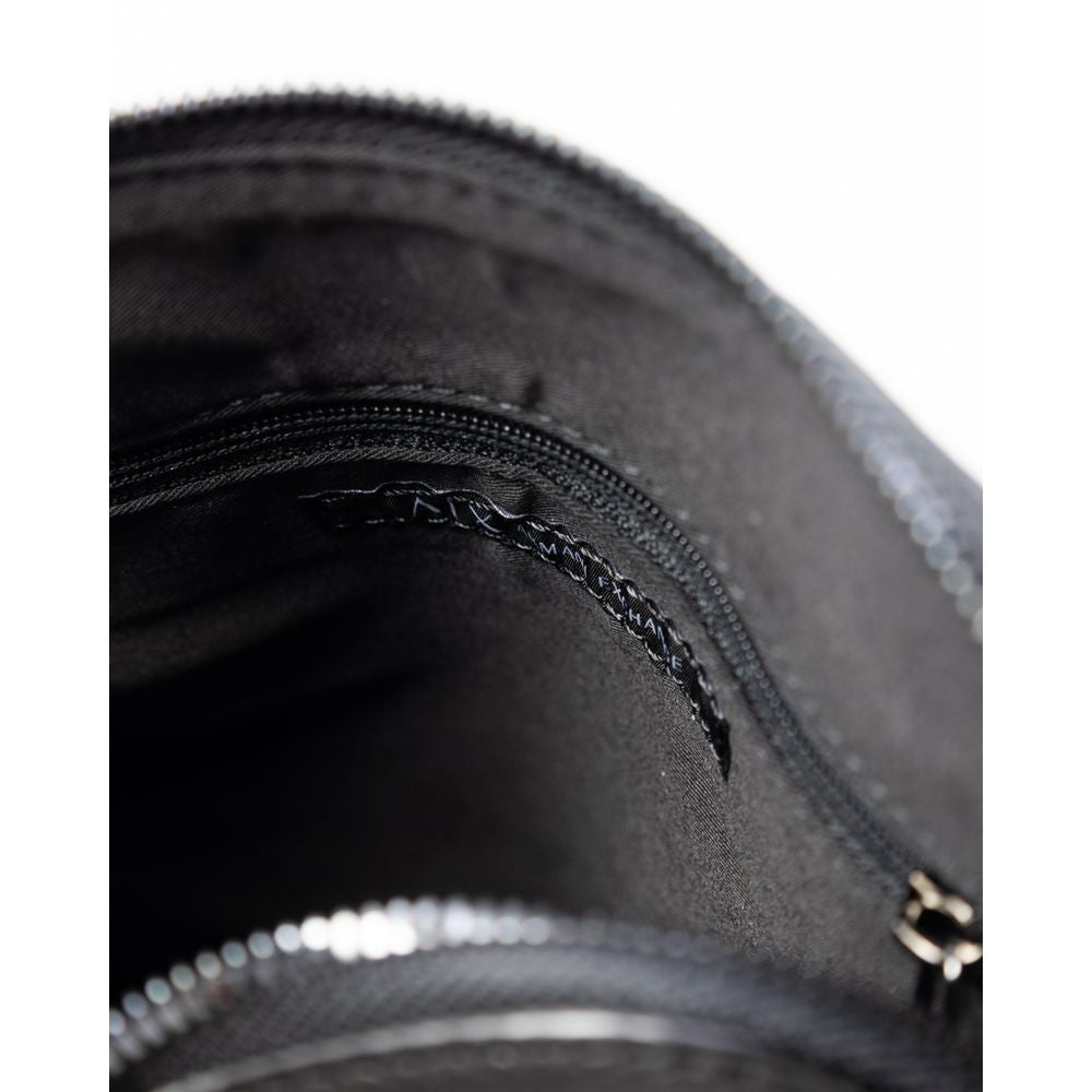 Close-up of Armani Exchange Black Polyester Messenger Bag interior showing zip pocket and stitching detail.