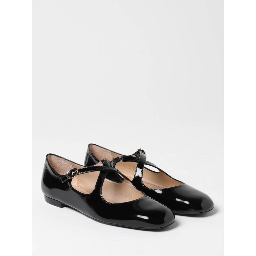 Stuart Weitzman Black Patent Leather Ballet Flats for Women in size 6.5, featuring elegant and sleek design on white background.