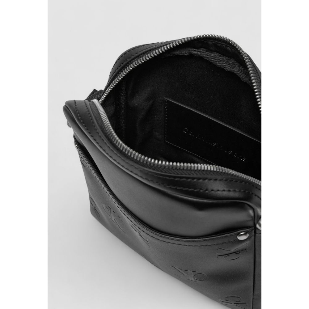 Interior view of Calvin Klein Jeans Black Polyethylene Messenger Bag with zipper and brand detailing, ideal for daily use.