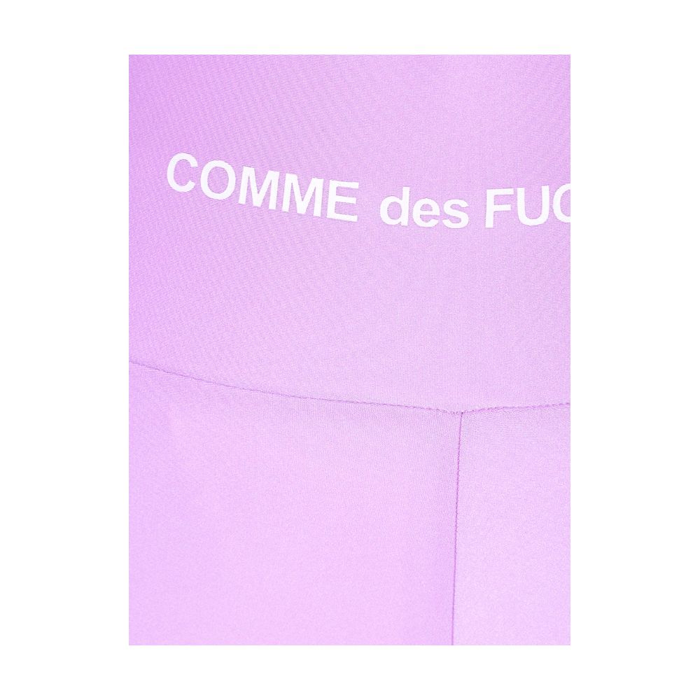 Detail view of Comme Des Fuckdown Purple Polyester Short with logo print on stretch lycra biker shorts.