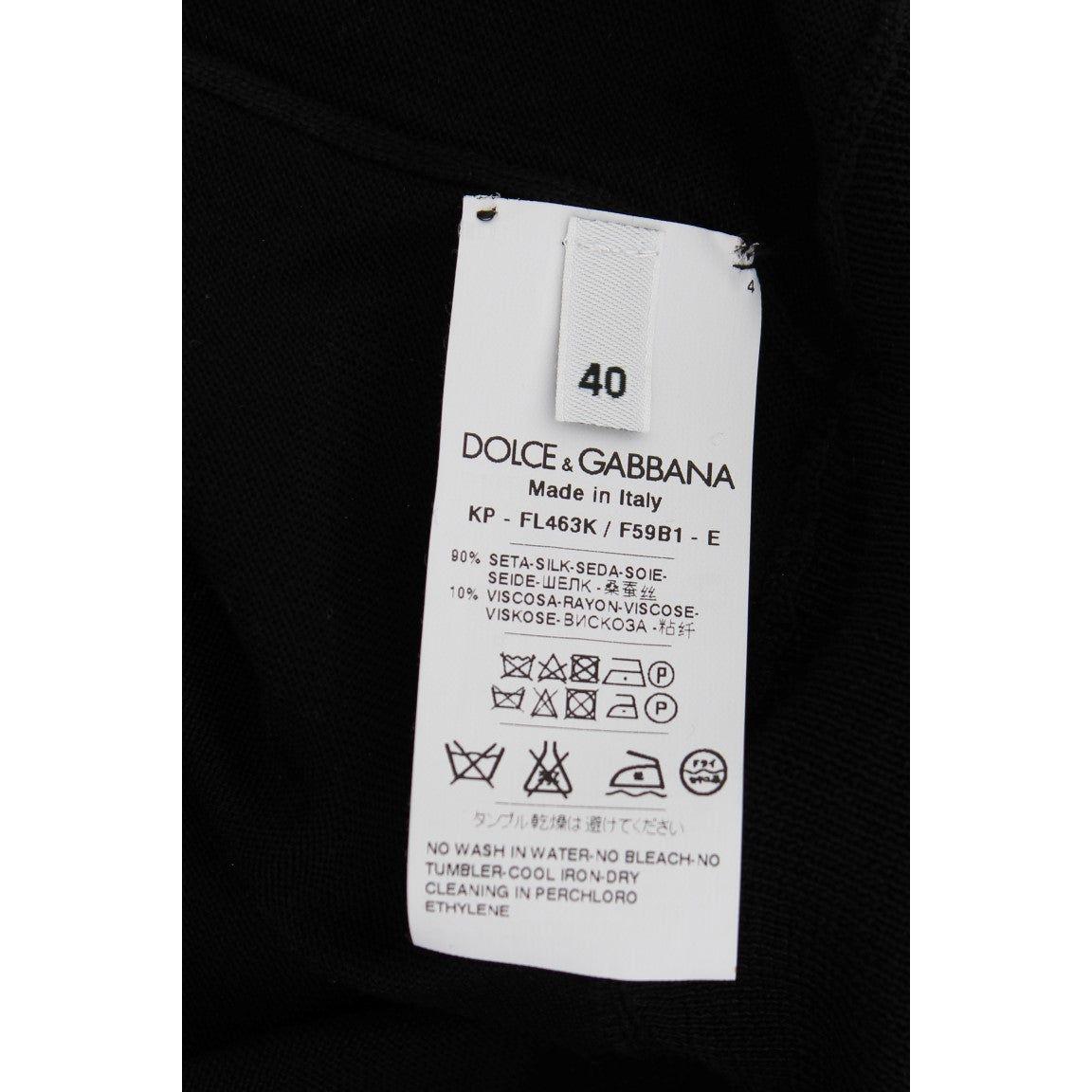 قميص بولو أنيق من الحرير الأسود مزين بالزهور من دولتشي آند غابانا