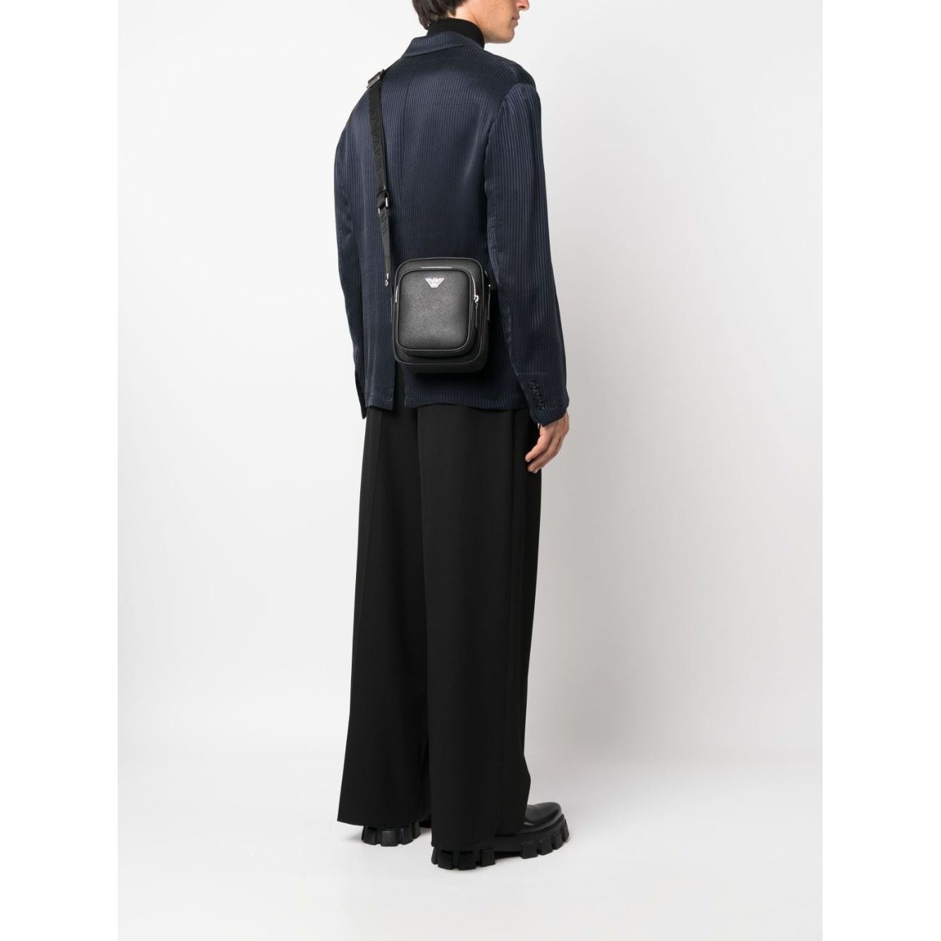 Front view with bag zipped and handles upright.