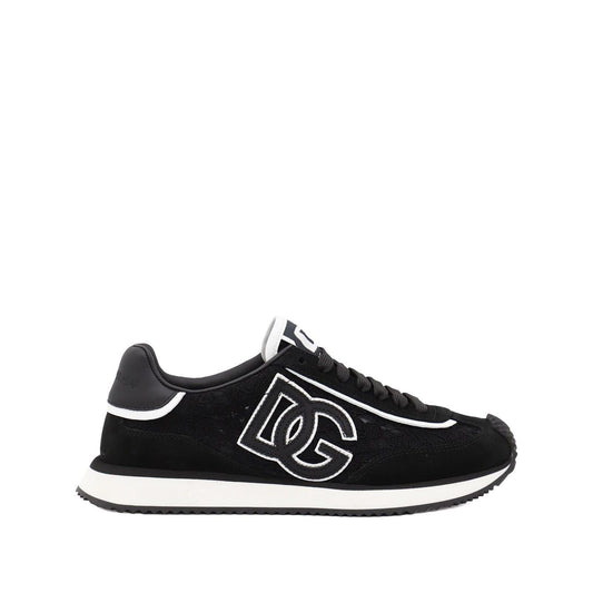 Dolce & Gabbana Sneakers Black with logo patch, front lace-up, and branded heel counter on a rubber sole.