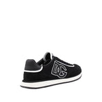 Dolce & Gabbana Sneakers Black with rubber sole and branded heel counter, showcasing DG logo on a sleek design.