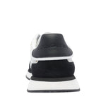 Back view of Dolce & Gabbana Sneakers White with a branded heel counter and rubber sole.