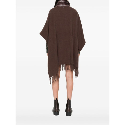Herno Jackets Brown wool poncho with fringe trim, high neck, quilted pockets, and drawstring detail, 105cm length shown on model.
