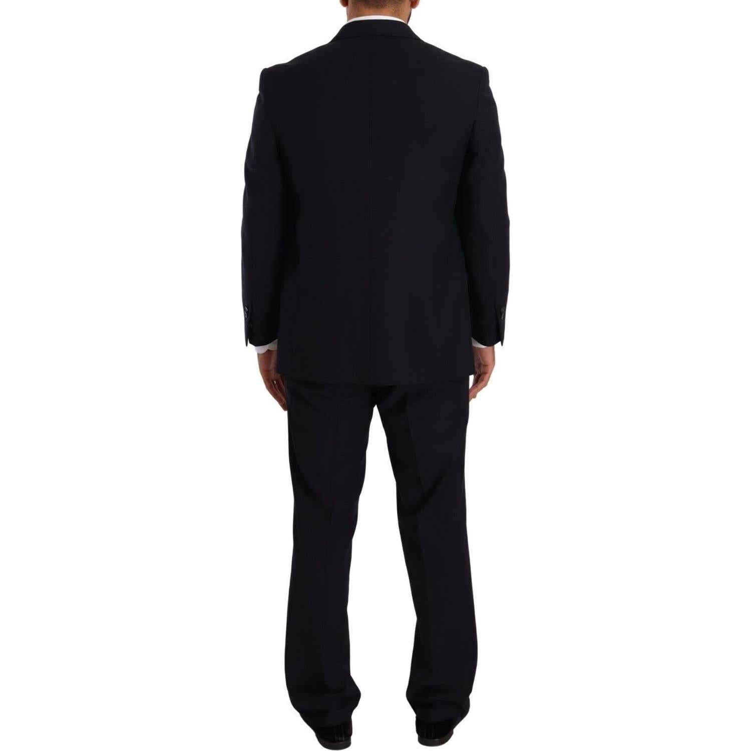 بدلة زرقاء رائعة من قطعتين من تصميم دومينيكو تاجلينتي مع سترة بلايزر مفككة