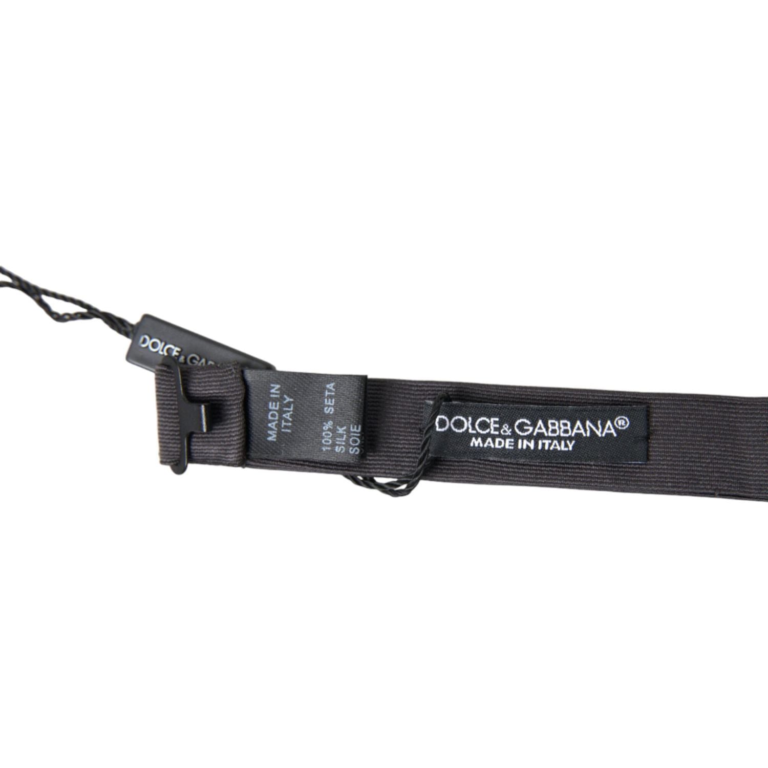 ربطة عنق أنيقة من الحرير باللون الرمادي الداكن من دولتشي آند غابانا