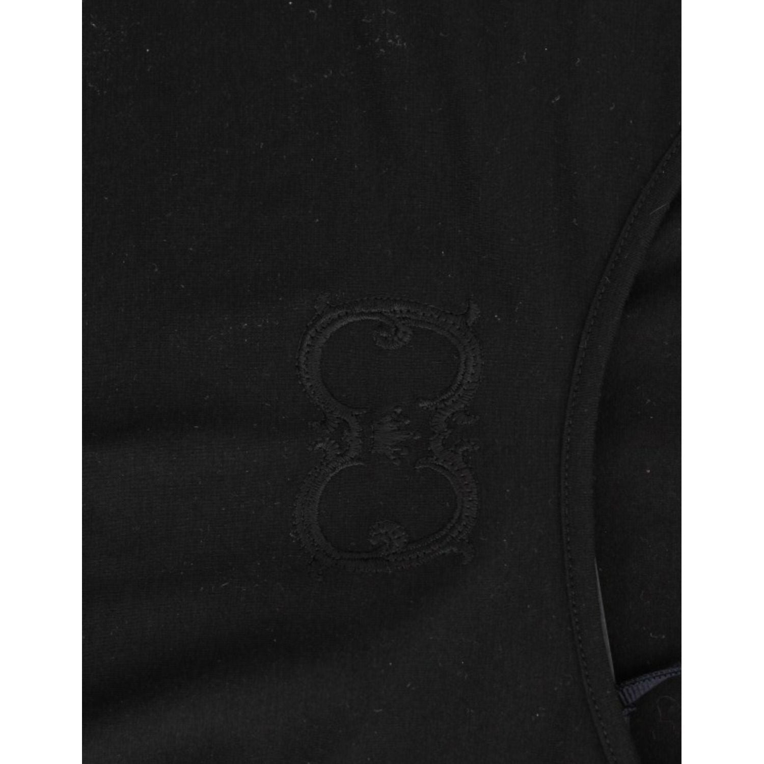 بلوزة كافالي الأنيقة بأكمام قصيرة باللون الأسود