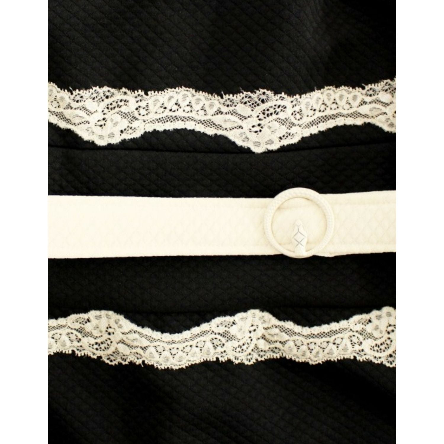 فستان كافالي الأنيق من الدانتيل باللونين الأسود والبيج