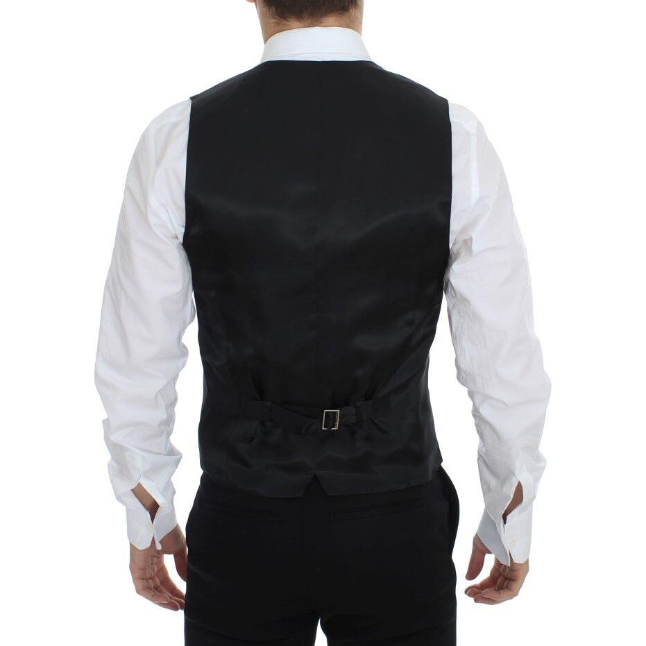 فستان دولتشي آند غابانا الأنيق المصنوع من الصوف والحرير باللون الأسود المخطط