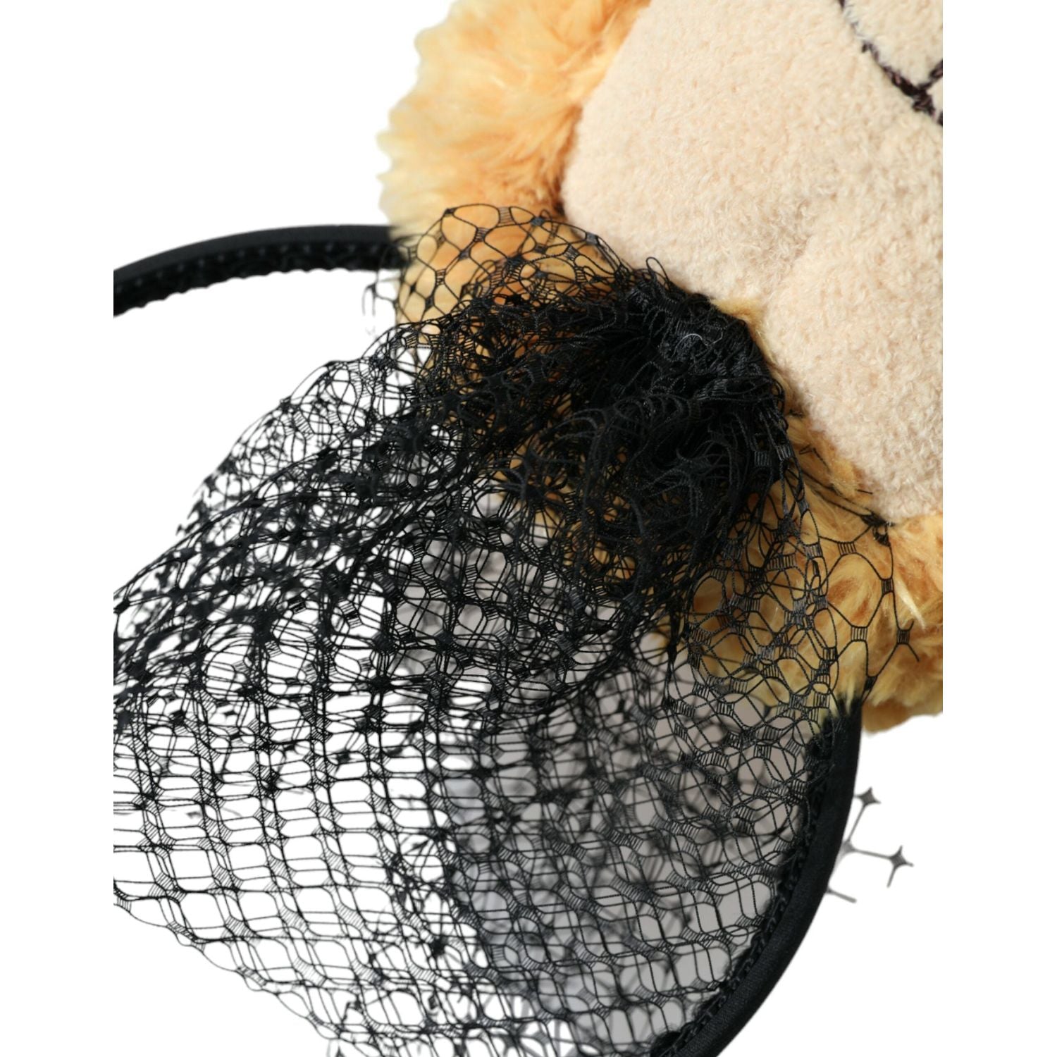 طوق شعر على شكل دب بني من دولتشي آند غابانا على شكل تاج من الكريستال الذهبي