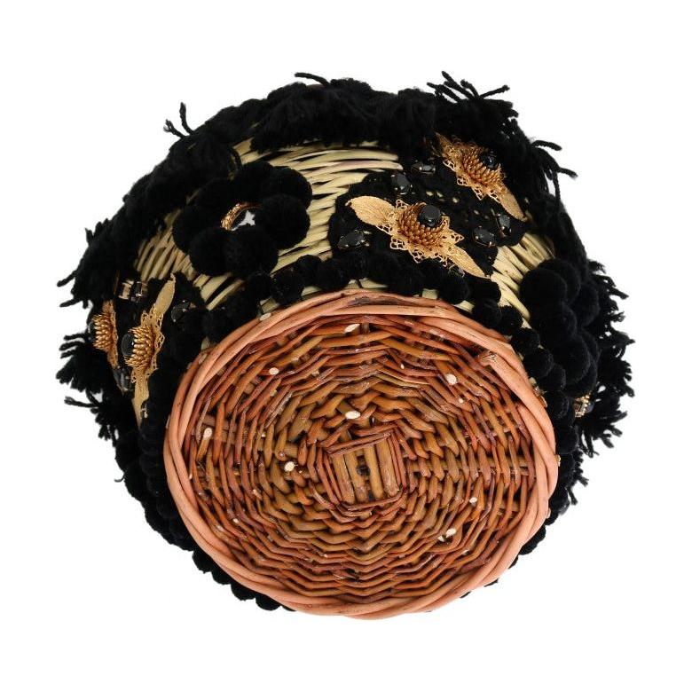 别致的米色和黑色草编蛇皮水桶包