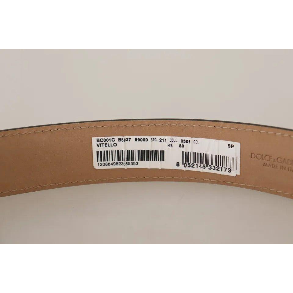 حزام دولتشي آند غابانا من الجلد الأسود مع مشبك معدني ذهبي محفور عليه شعار