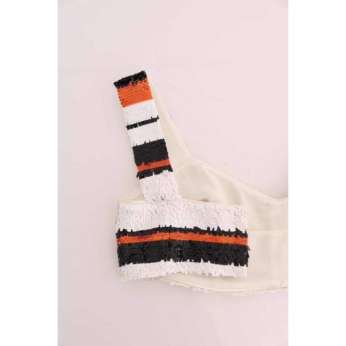 بلوزة من دولتشي آند غابانا مزينة بالترتر بألوان نابضة بالحياة