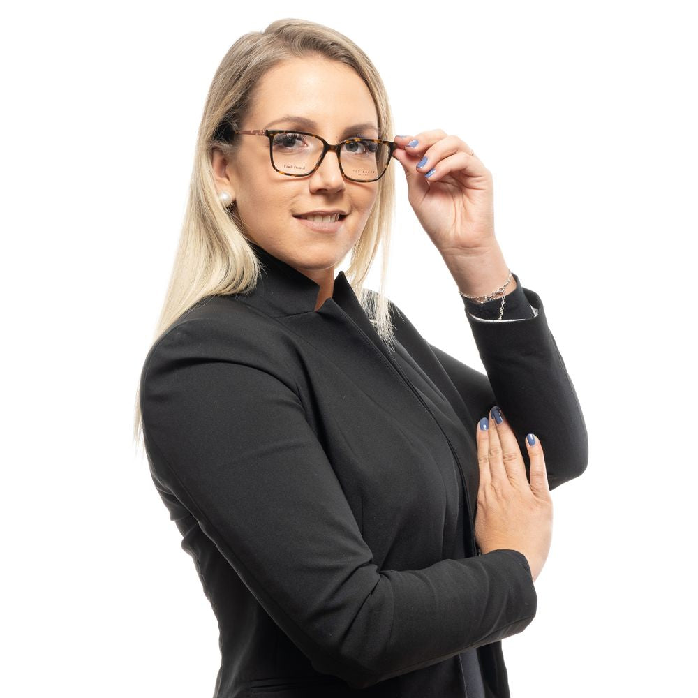 Woman wearing Ted Baker Brown Women Glasses Frame with square full-rim design, no lenses effect, in a professional setting.