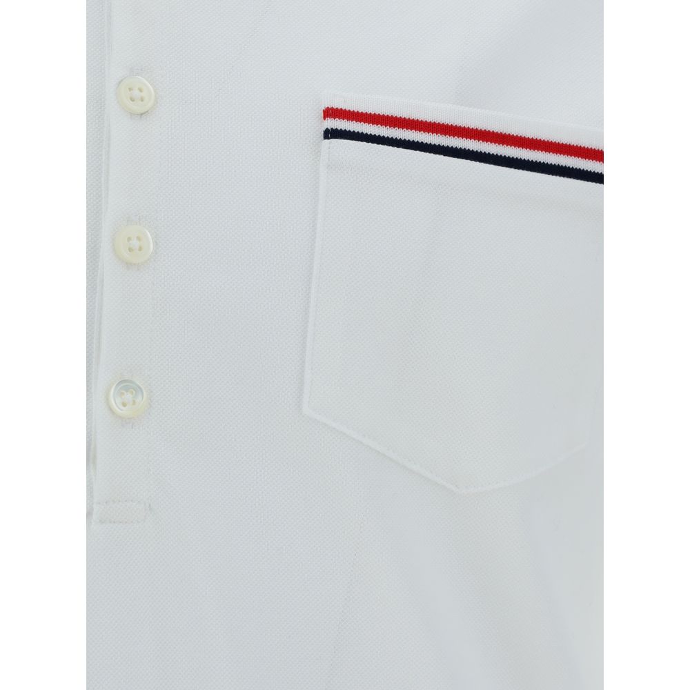Close-up of Thom Browne White Cotton Polo Shirt showing collar, buttons, and front pocket with iconic bands.