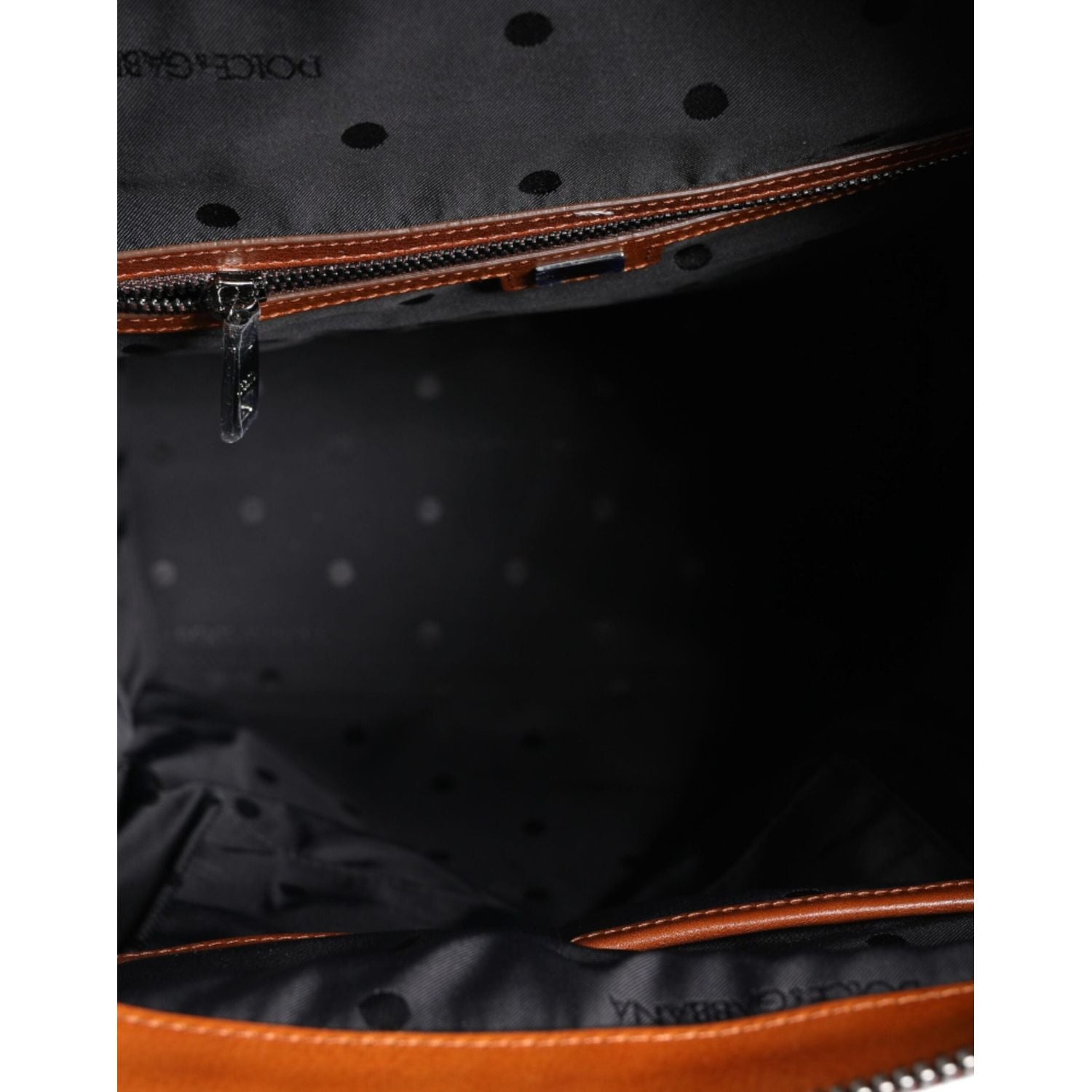 Front view with bag zipped and handles upright.