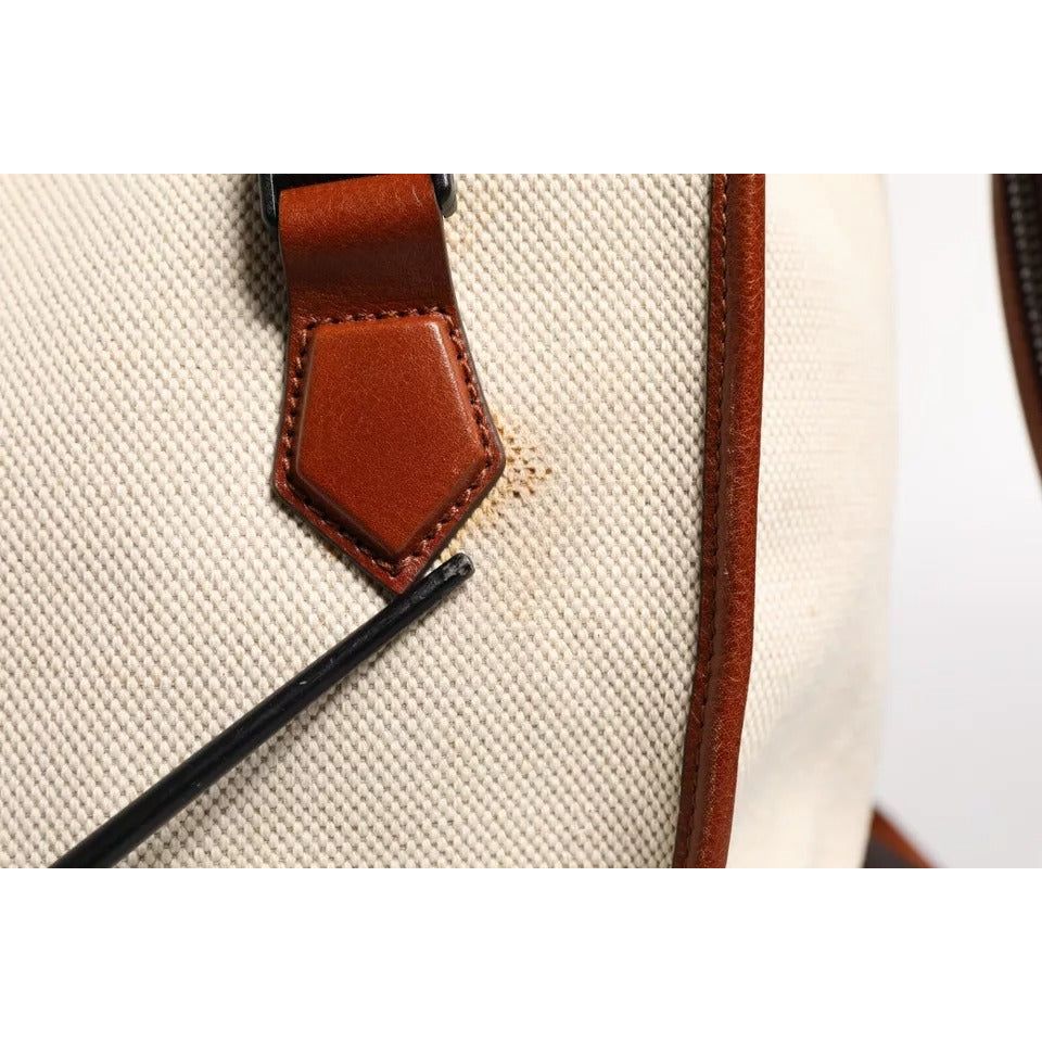 Front view with bag zipped and handles upright.