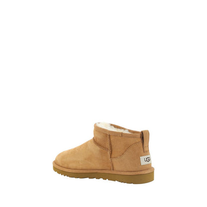 UGG Brown Goatskin Ankle Boots with shearling lining and embossed stitching.