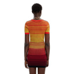 Back view of Desigual Red Viscose Midi women's dress in spring/summer collection, 75% viscose, 25% polyamide composition.