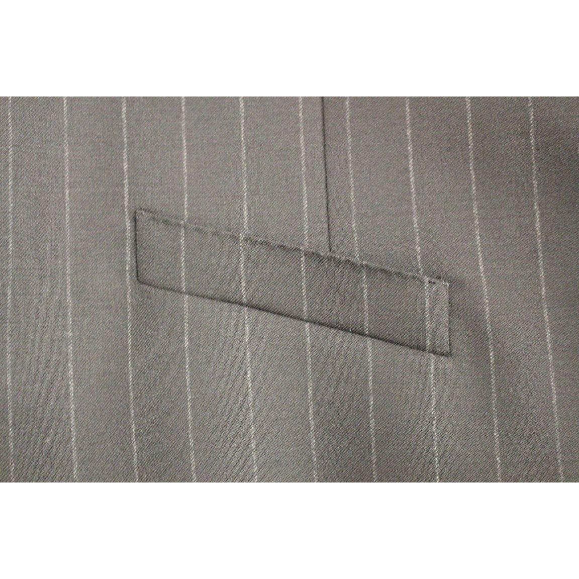 فستان من الصوف المخطط باللون الأسود من دولتشي آند غابانا