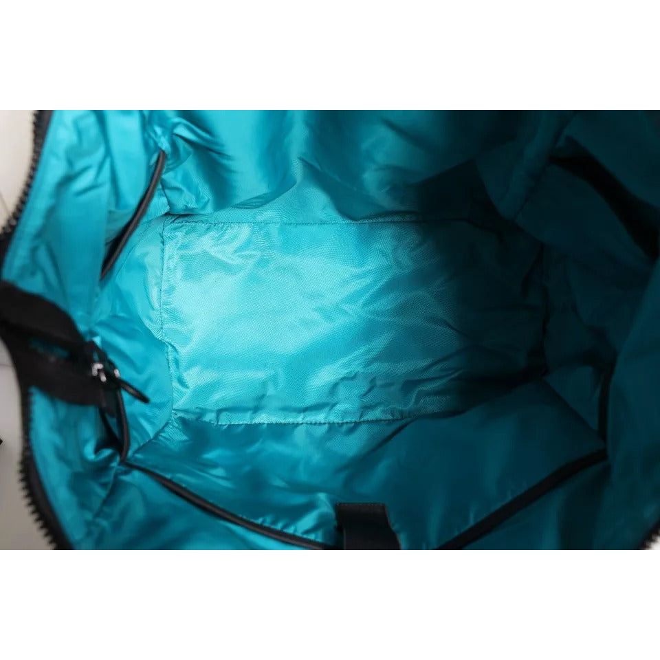 Front view with bag zipped and handles upright.