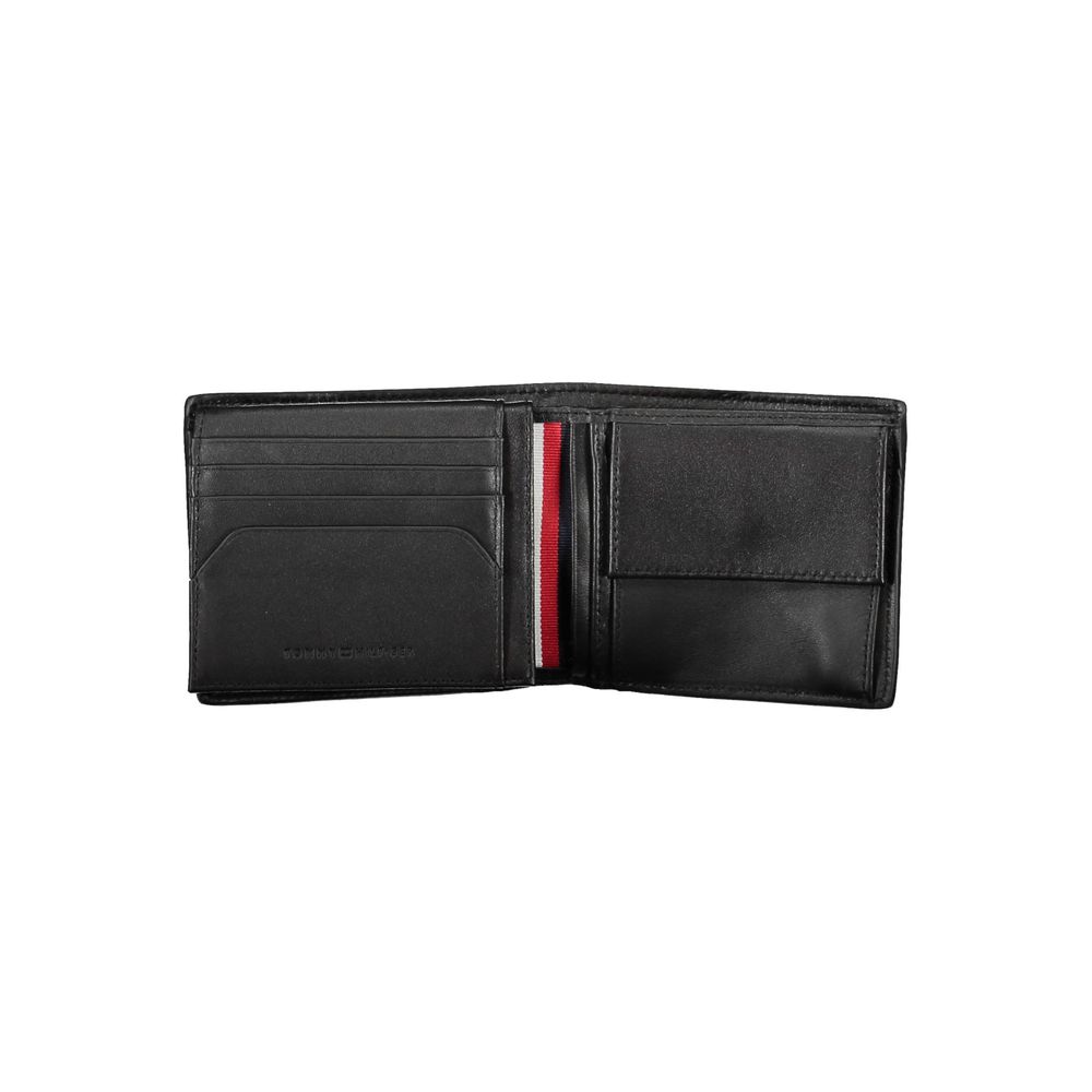 Tommy Hilfiger Black Leather Men Wallet open showing compartments with logo detailing.