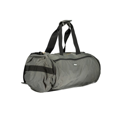 K-WAY Green Polyamide Luggage And Travel bag with shoulder handles, adjustable strap, zip closure, and multiple pockets.