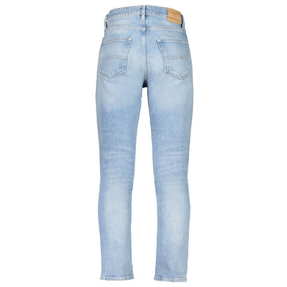 Rear view of Tommy Hilfiger Blue Cotton Men Jeans showcasing tapered fit and iconic embroidery, perfect for a casual day out.