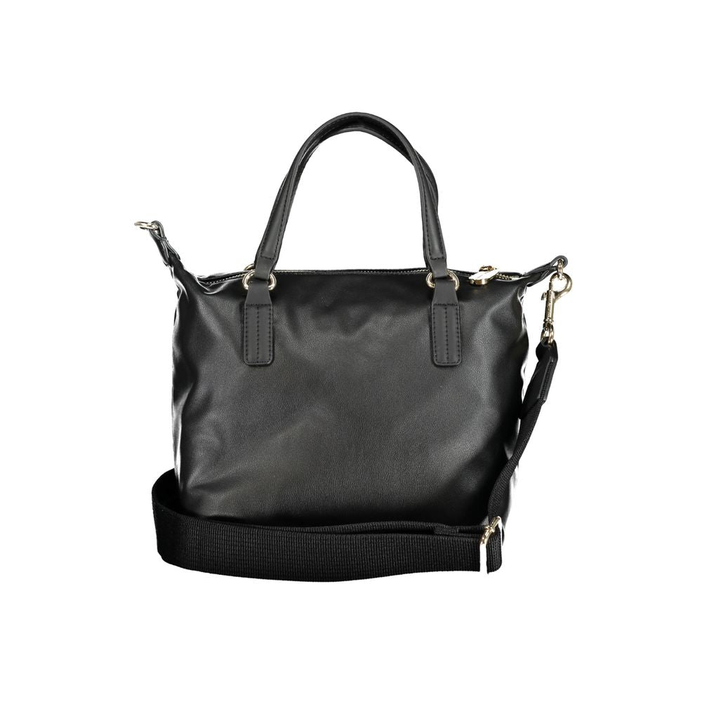 Tommy Hilfiger Black Polyester Handbag with zip closure, internal pocket, adjustable and removable shoulder strap, two handles.