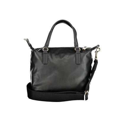 Tommy Hilfiger Black Polyester Handbag with zip closure, internal pocket, adjustable and removable shoulder strap, two handles.