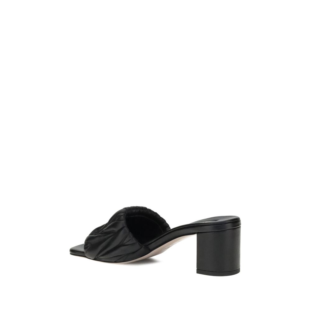 Miu Miu Black Lamb Ovis Aries Aries Stiletto Heel Sandals side view, featuring padded straps and geometric heel.