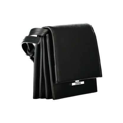 Calvin Klein Black Polyethylene Handbag with adjustable shoulder strap, three compartments, internal pocket, and logo snap closure.
