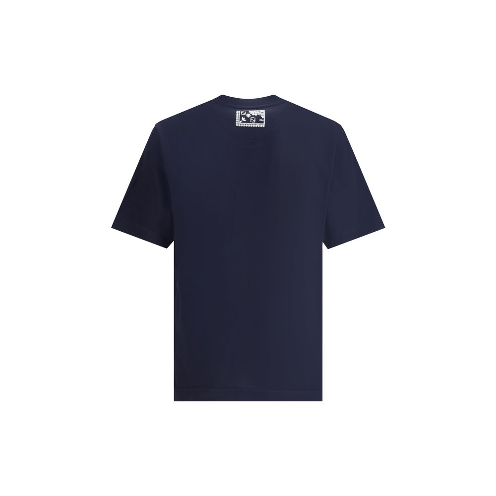 Fendi Blue Cotton T-Shirt with iconic monogram patch, featuring slit pocket and contrasting bandana print for a graphic touch.