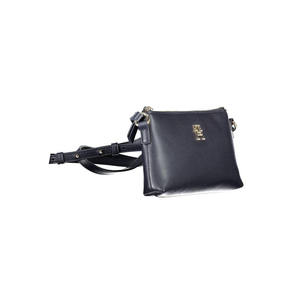 Front view with bag zipped and handles upright.