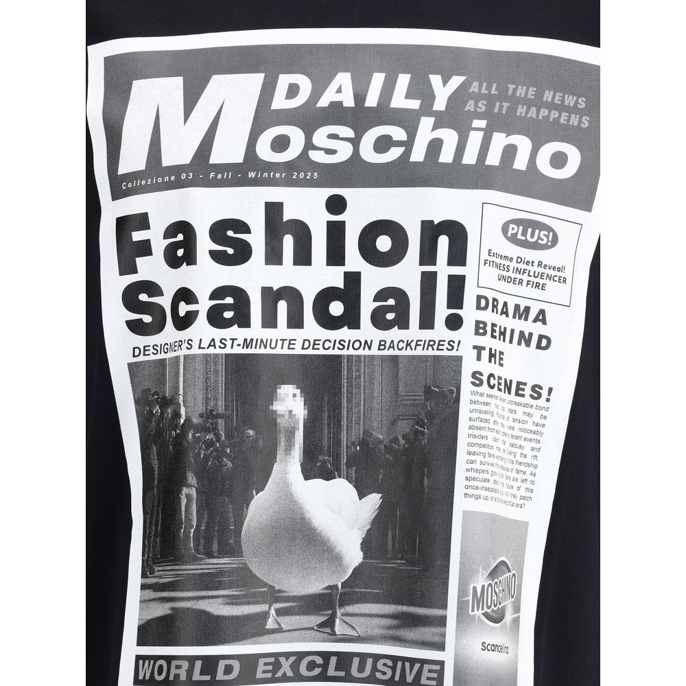 Moschino Black Cotton T-Shirt featuring a bold newspaper print with dramatic headlines, showcasing the brand's iconic monogram.