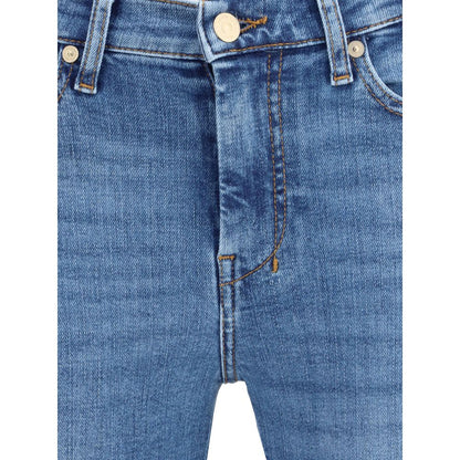 Close-up of 7FOR Blue Cotton Flared Jeans showing front button closure and classic five-pocket design in blue denim.