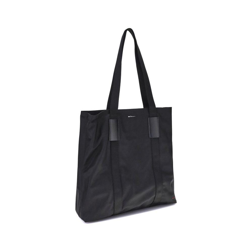 Front view with bag zipped and handles upright.