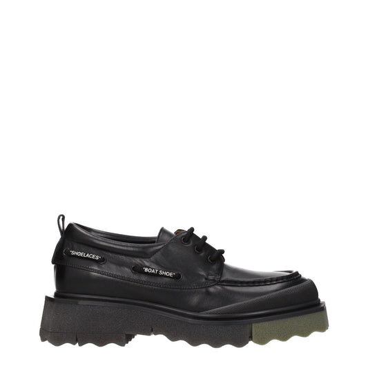 Off-White Black Leather Slip-On Loafers with vintage effect, rubber sole, mid heels, and round toe design in street style.