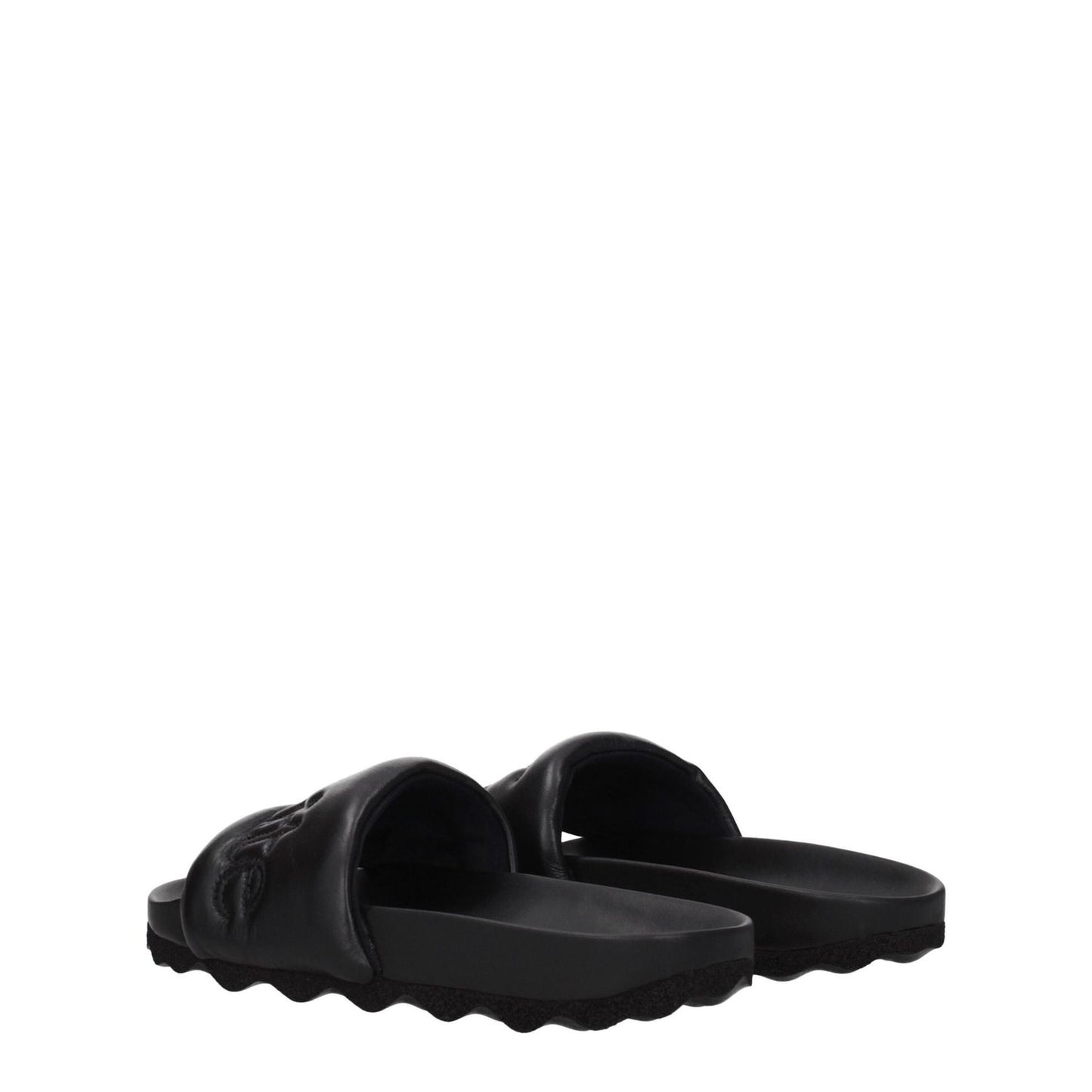 Off-White Black Leather Slippers with front logo, casual style, low flat heel, round toe, rubber sole, shown at an angle.
