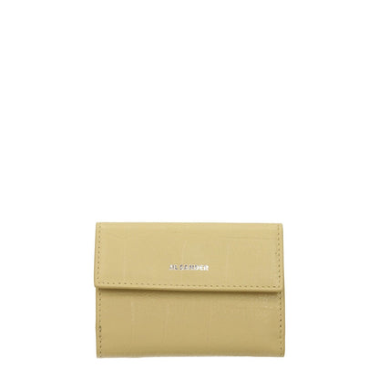 Jil Sander Yellow Leather Wallet with crocodile print, button closure, and front logo, featuring a casual style and coin holder.