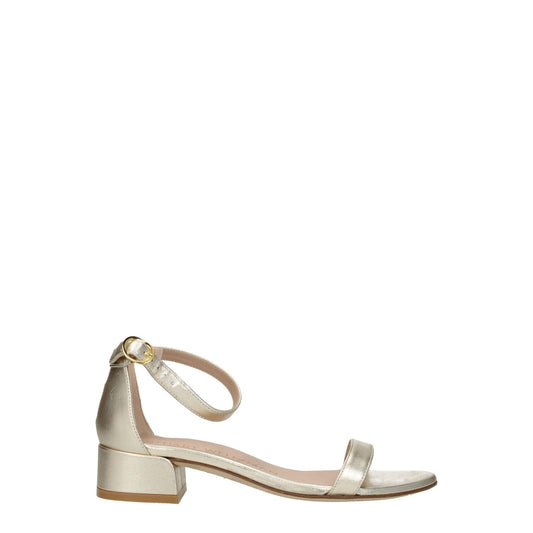 Stuart Weitzman Gold Leather Flat Sandals with buckle closure, open toe, 3.5 cm heel, metallic platinum accent, and leather sole.