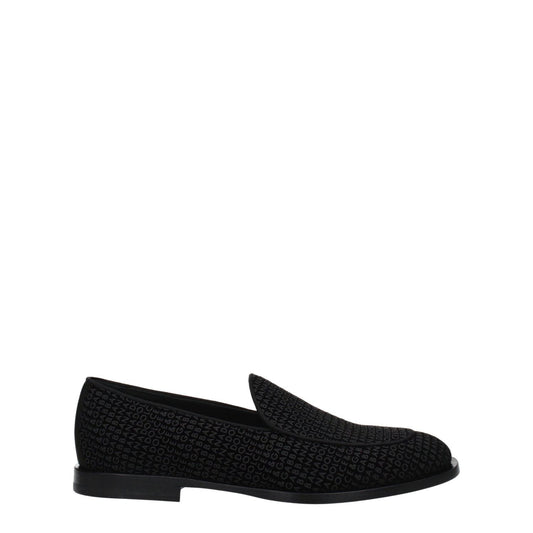 Dolce & Gabbana Black Velvet Slip-On Loafers with round toe and leather sole, featuring a stylish design and logo embossing.