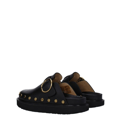 Isabel Marant Black Leather Slippers with studs and buckle closure, vintage style, round toe, rubber sole, low flat heel.