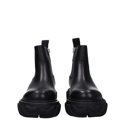 Off-White Black Leather Ankle Boots with side logo and zip closure, featuring rubber sole, mid heels, and round toe design.