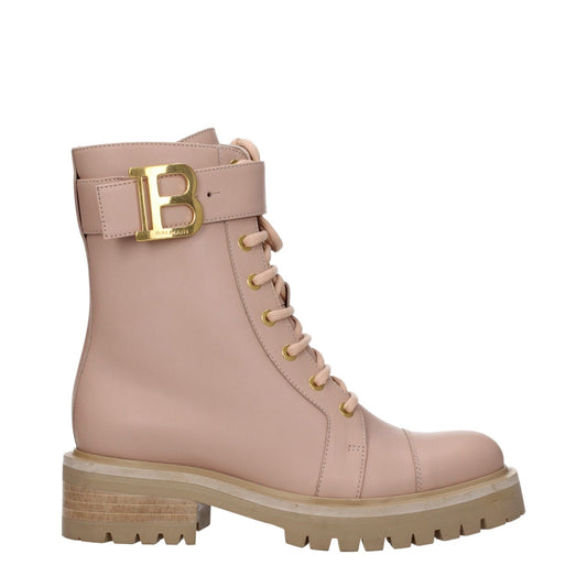 Side view of Balmain Beige Leather Ankle Boots with lace-up closure and logo, featuring rubber sole and 4.5 cm mid heel.